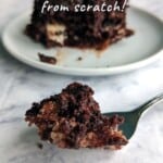 bite of earthquake cake on a fork in front of a plate, with text overlay for Pinterest