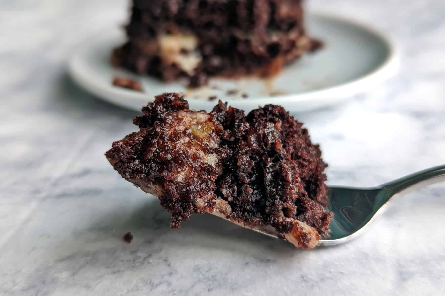 earthquake cake cake on a fork in front of a plate