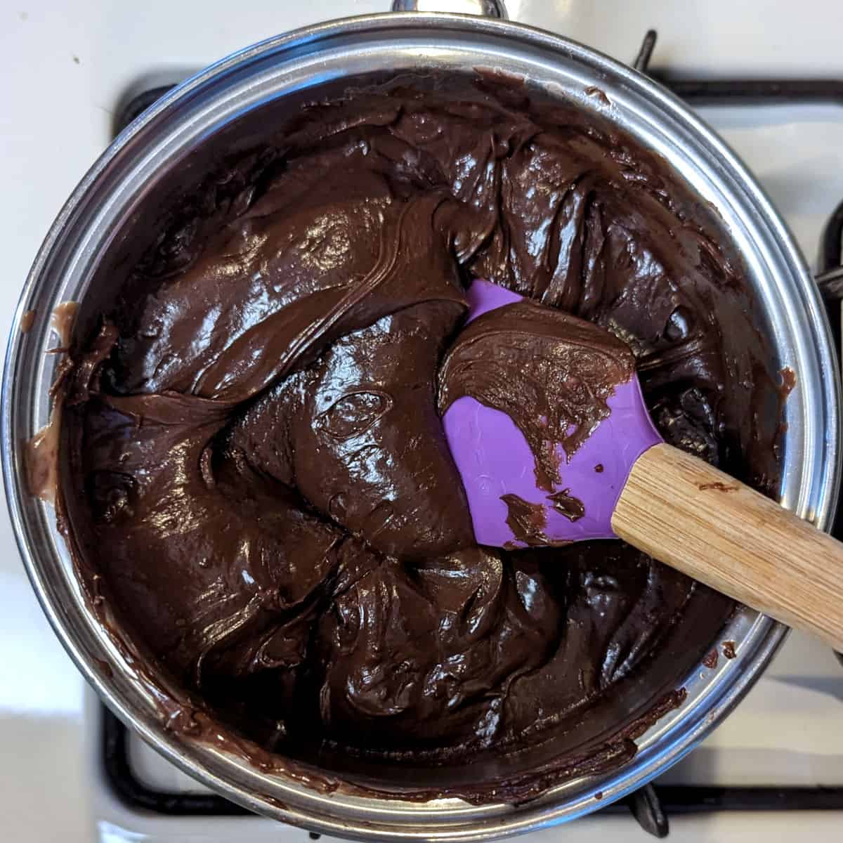 chocolate fudge ganache, melted, in a saucepan