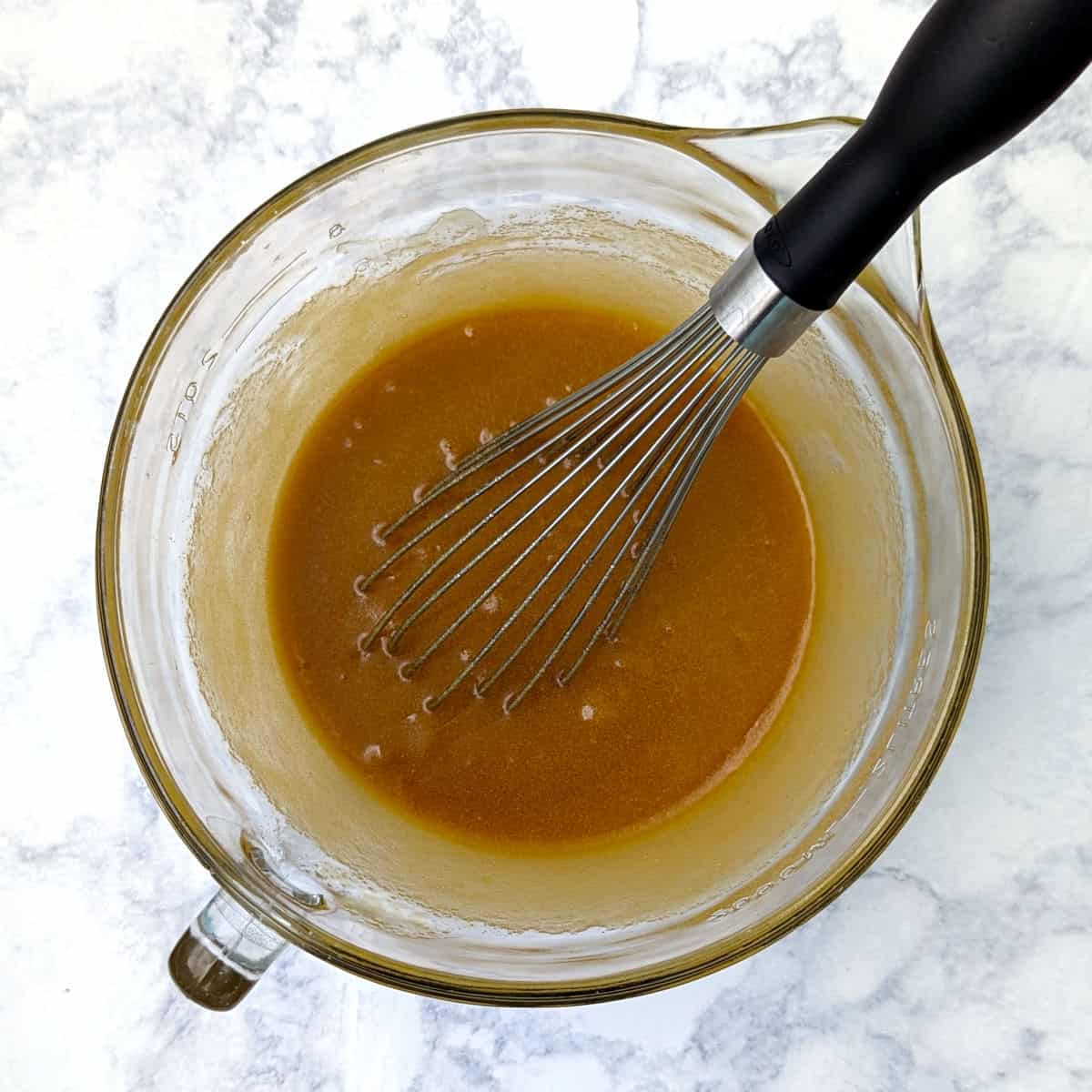 melted butter, brown sugar, eggs, and vanilla, in a mixing bowl