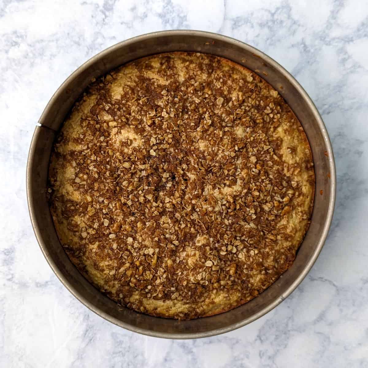 sour cream coffee cake, baked, still in the springform pan