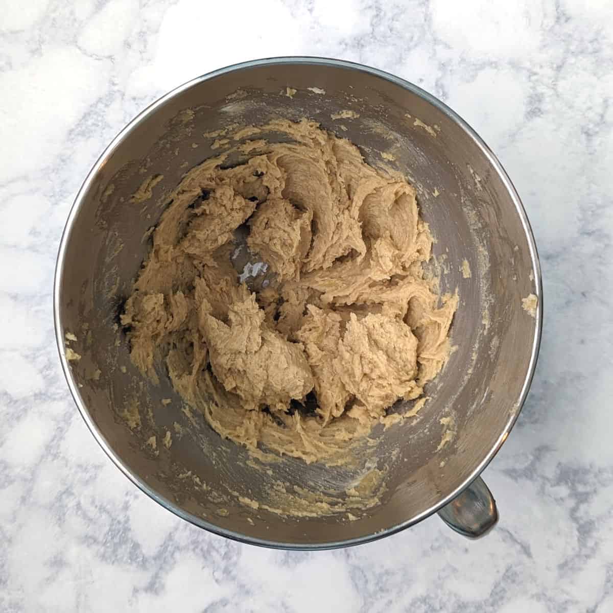 butter, brown sugar, and egg, creamed together in a stand mixer bowl