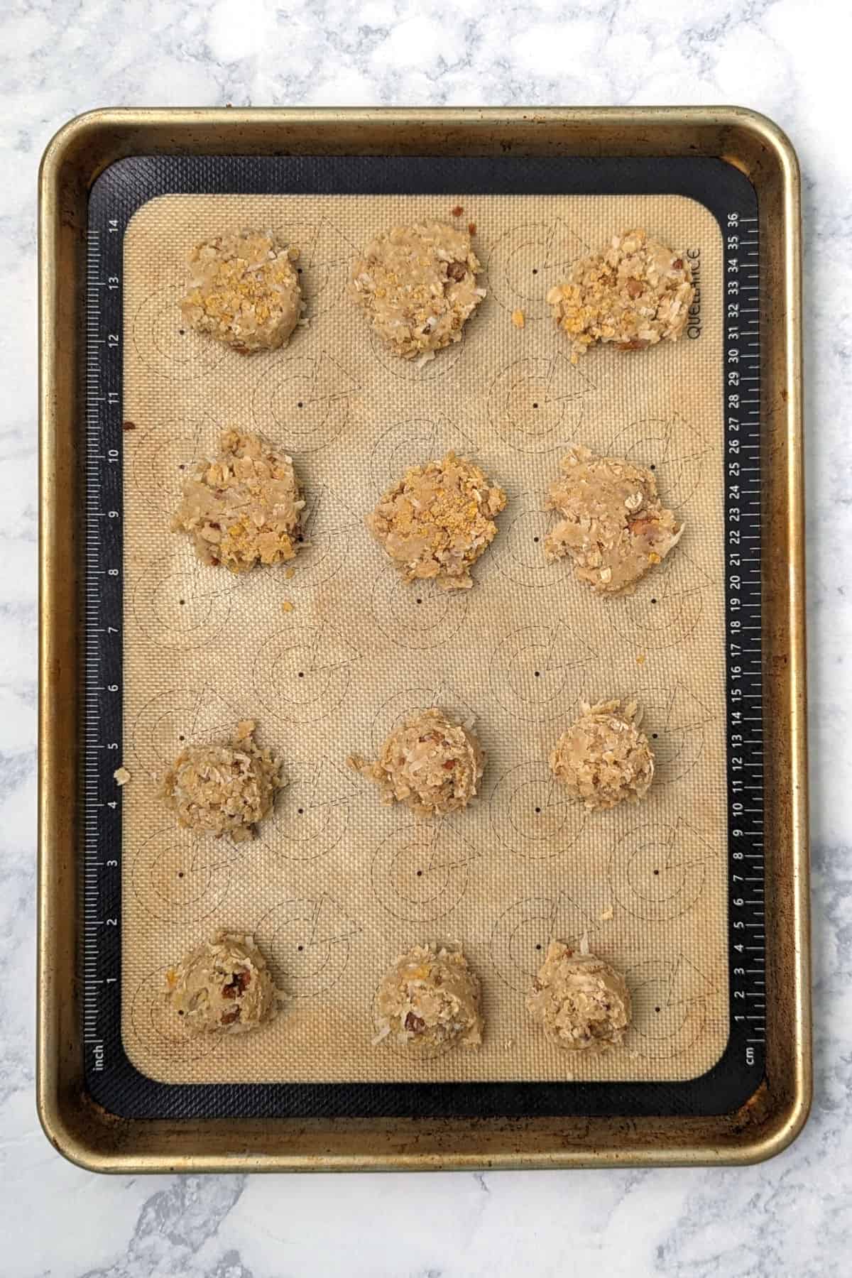 balls of dough for spellbinders, on a baking sheet