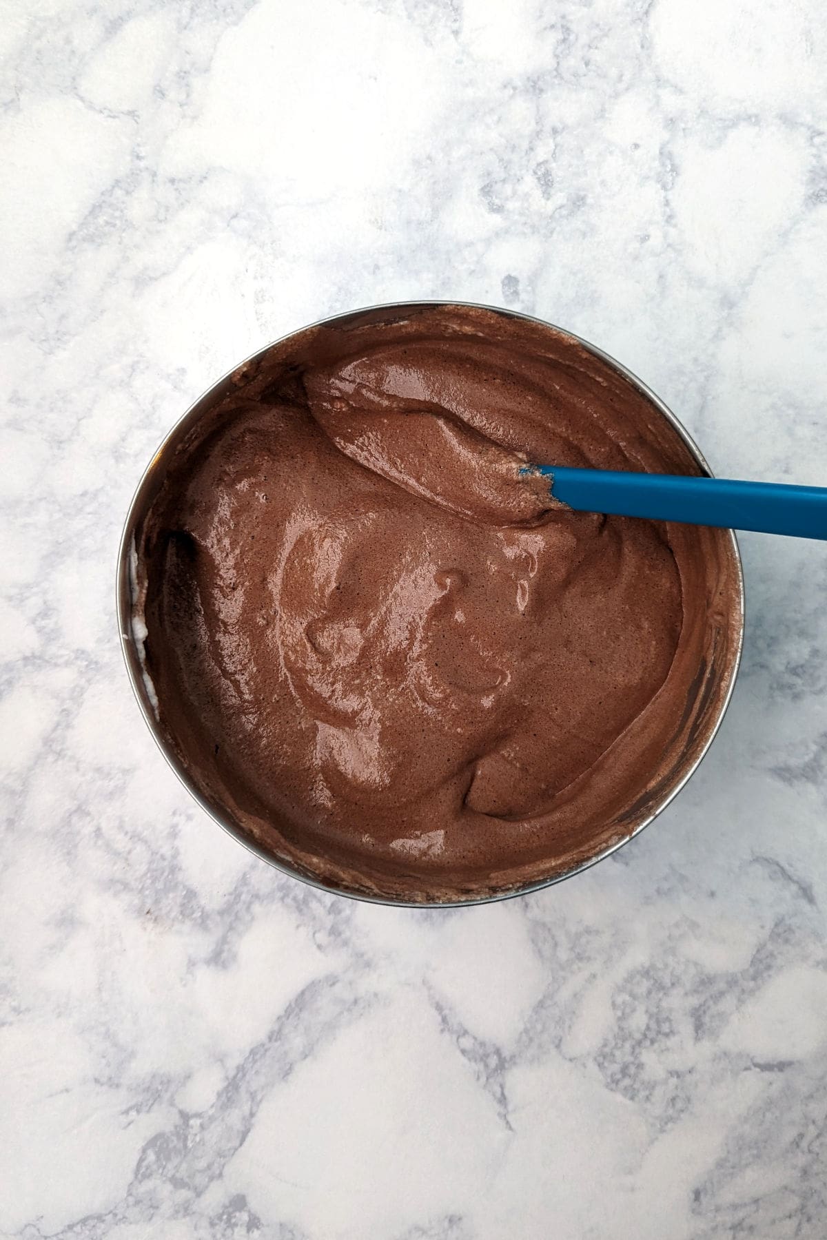 completely mixed flourless chocolate cake batter