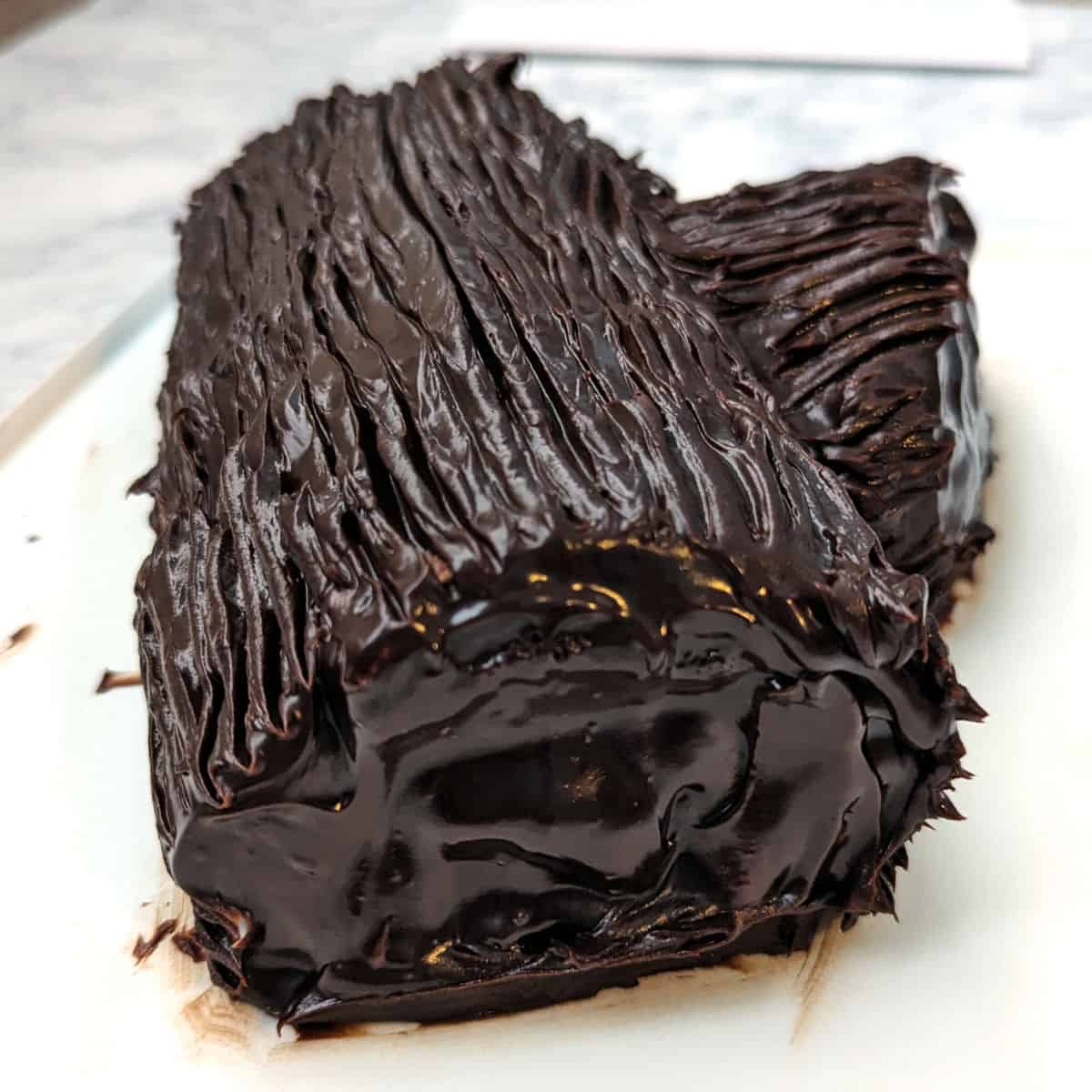 yule log, with lines made in the ganache with the tines of a fork