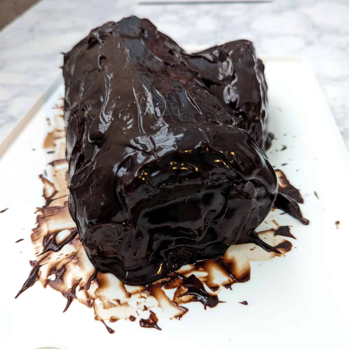 yule log with the cut ends covered with ganache