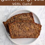 Two slices of banana bread, stacked and staggered, on a plate. Text overlay for Pinterest reads "Classic Banana Bread With Oats! A No-Mixer Recipe!"