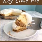 A fork holds up a bite of key lime pie. The rest of the pie is in the background. Text overlay for Pinterest reads "Homemade Key Lime Pie. Cool & Creamy. Tart & Delicious!"