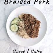 Soy-Cola Braised Pork, plated alongside brown rice and cucumbers. Text overlay for Pinterest reads "Sweet | Salty. Tangy | Tender."