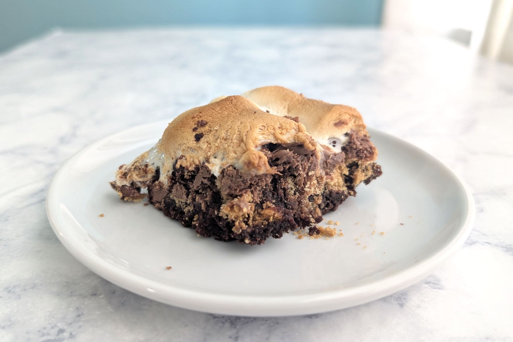 A s'mores brownie, on a plate.