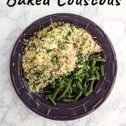 Salmon with Baked Couscous, alongside green beans on a purple plate.