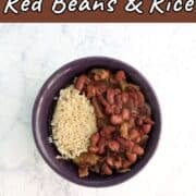 Vegetarian Slow Cooker Red Beans and Rice, in a purple bowl. Text overlay for Pinterest reads "A Gluten-Free Meal!"