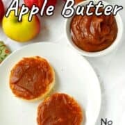 Slow Cooker Apple Butter in a ramekin and spread on English muffins. Text overlay for Pinterest reads "Slow Cooker Apple Butter. No Sugar Added!"