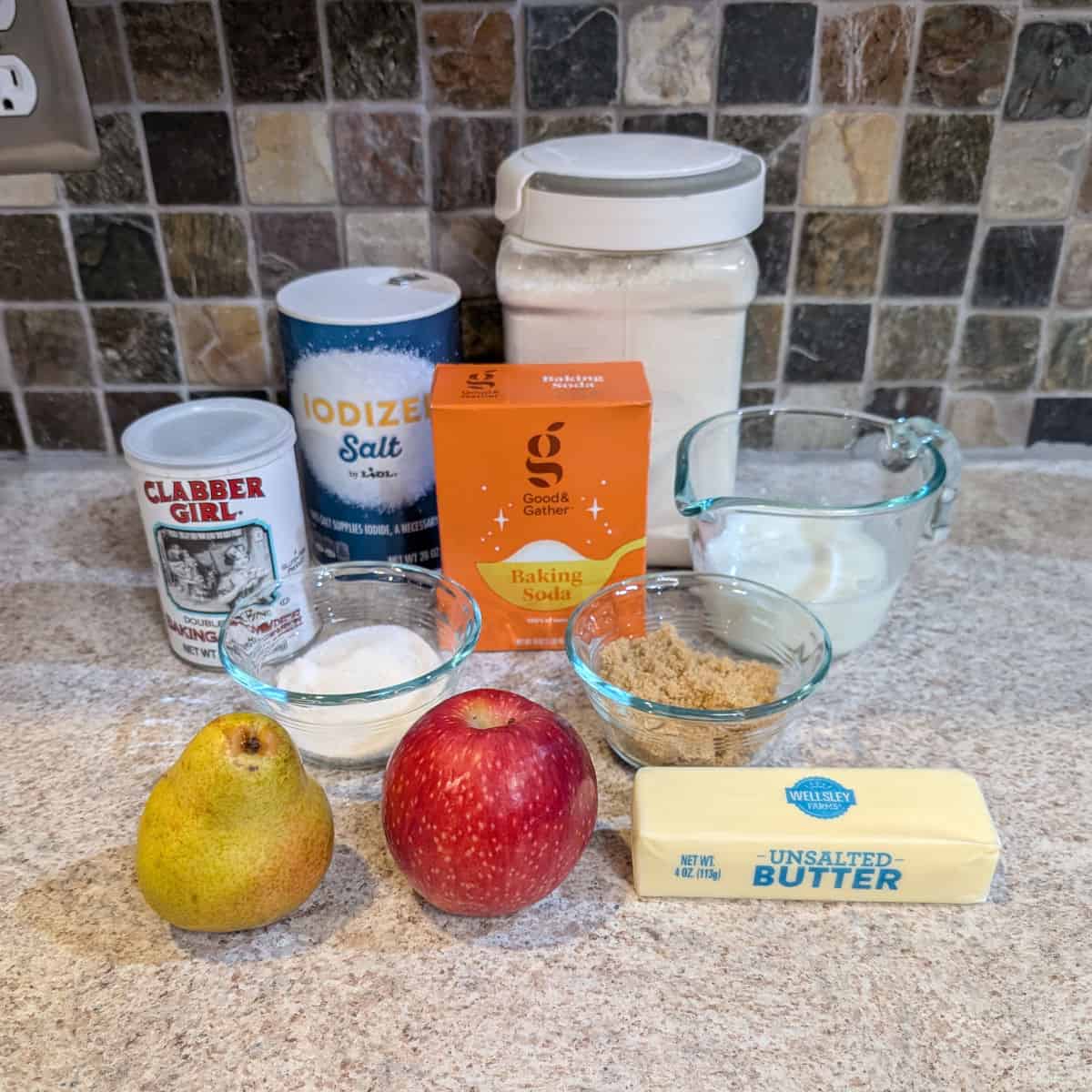 Ingredients for Apple and Pear Scones: Flour, salt, baking powder, baking soda, granulated sugar, brown sugar, buttermilk, pear, apple, butter.