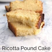 A slice of ricotta pound cake, broken into two and stacked to show texture. Background shows another slice of pound and a plate. Text overlay reads "Ricotta Pound Cake. Moist & Tender. Easy As Cookies."