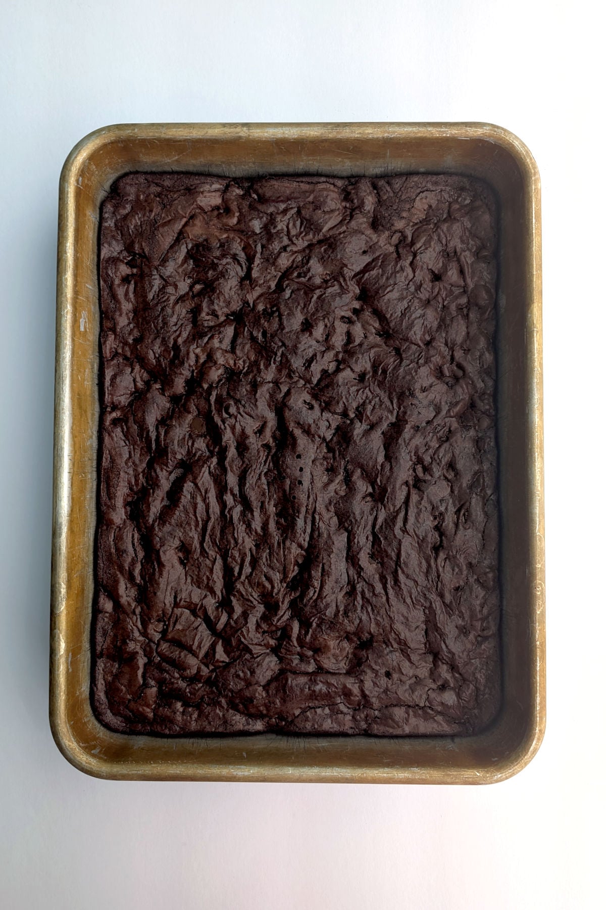 Fudge brownies, baked and cooled in a 9x13 inch baking pan.