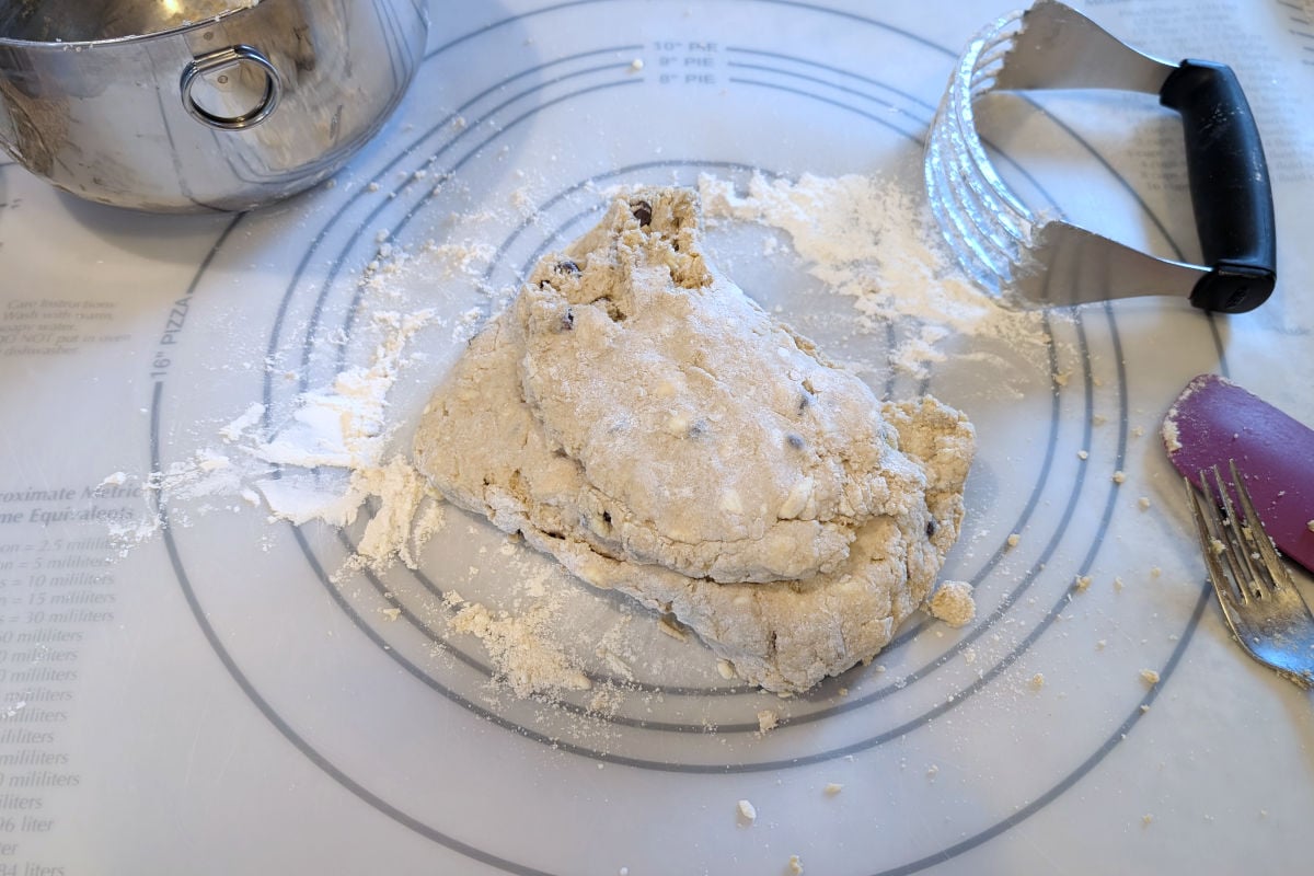 Chocolate chip cookie scone dough, folded over itself during kneading.