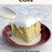 Milk pours from a spoon onto a plate holding a slice of Tres Leches Cake. Text overlay reads "Tres Leches Cake. Soaked Overnight. Never Mushy. Easy As Cookies."