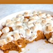 Very soft sweet potatoes topped with miniature marshmallows in a casserole dish, with part of the food already scooped out. Text overlay reads "Sweet Potatoes with Marshmallows. Just 2 Ingredients. Easy As Cookies."