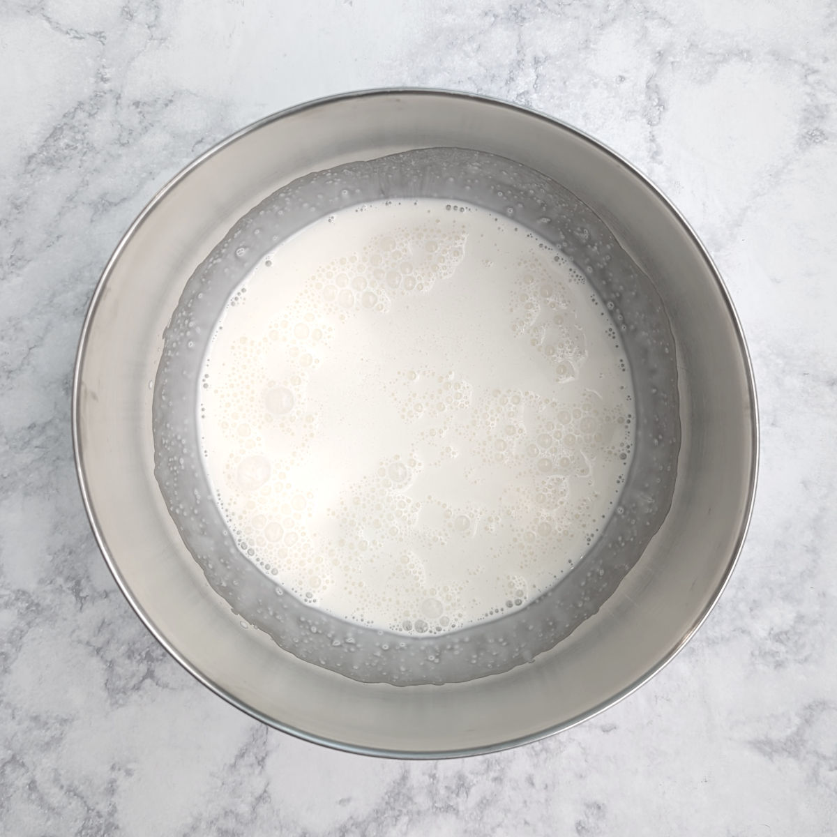 Heavy cream in a bowl.